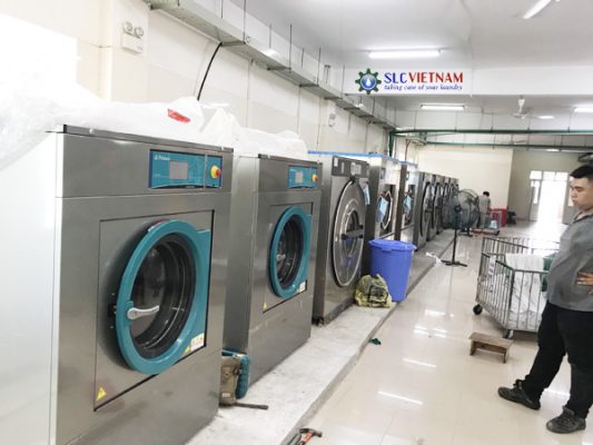 Hình ảnh: Các loại máy móc trong hệ thống giặt là
